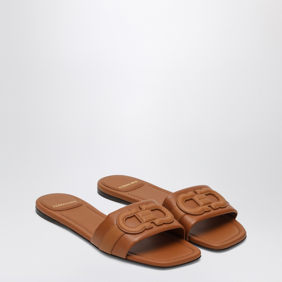 Ferragamo Gancini slide in cognac leather