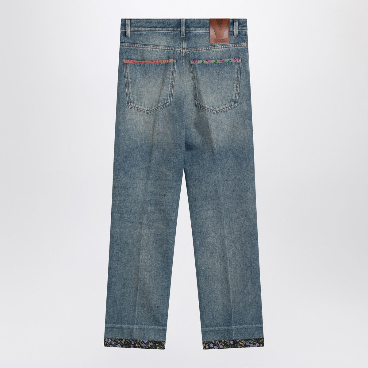 Valentino Washed blue jeans with floral fabric trims